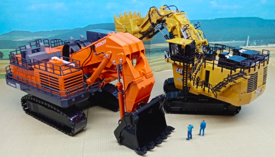 Deux monstres semblables HITACHI EX 8000 et CATERPILLAR 6060 FS. Total: Presque 5 Kgs de matière à elles deux !