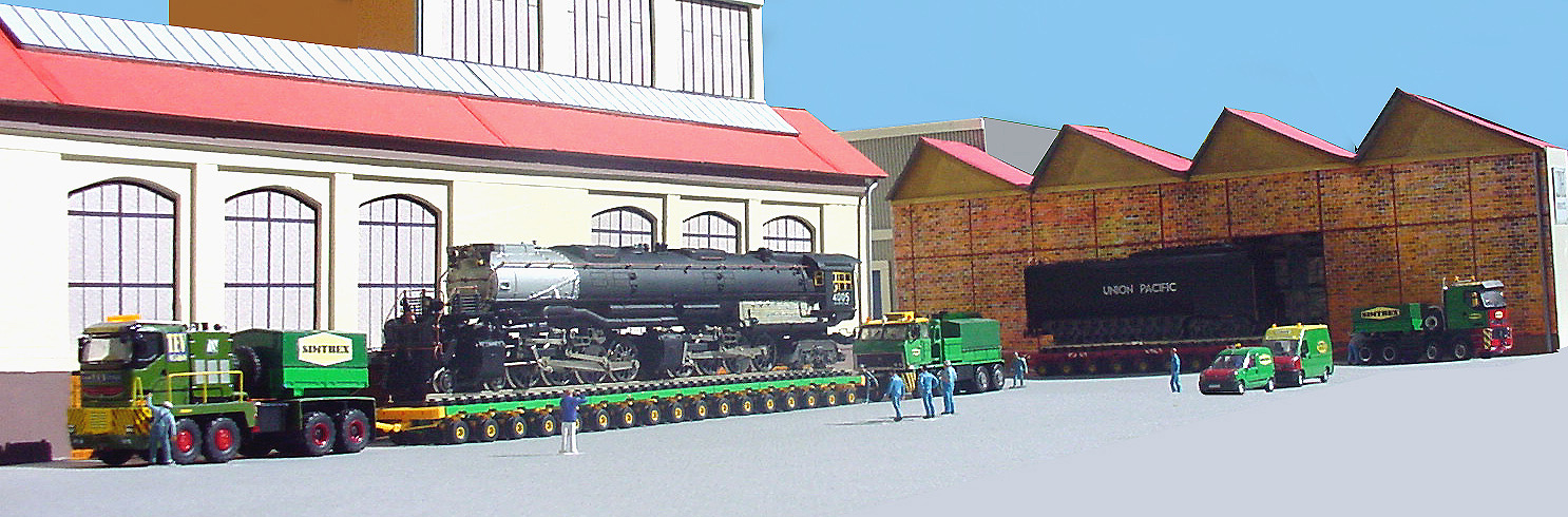 Une locomotive Big-Boy venant des U.S passe du bateau au plateau d'une 1000 pattes.Poids de la loco:351 tonnes, le tender:190  tonnes, capacités du tender: 94 m3 d'eau et 28 tonnes de charbon. Longueur loco + tender: 40,50 mètres