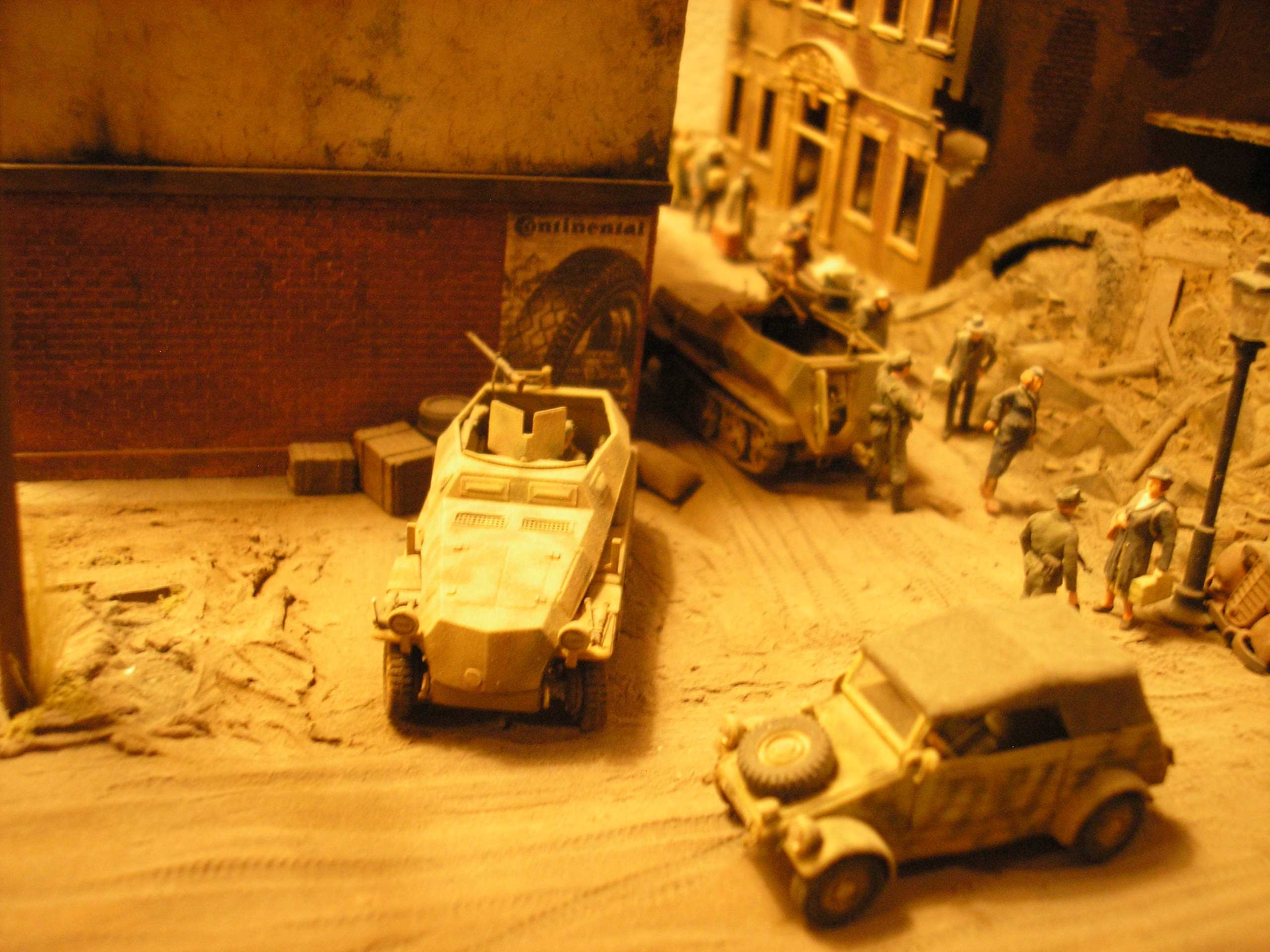 A previous Kubelwagen passing the third element of the Scout Platoon