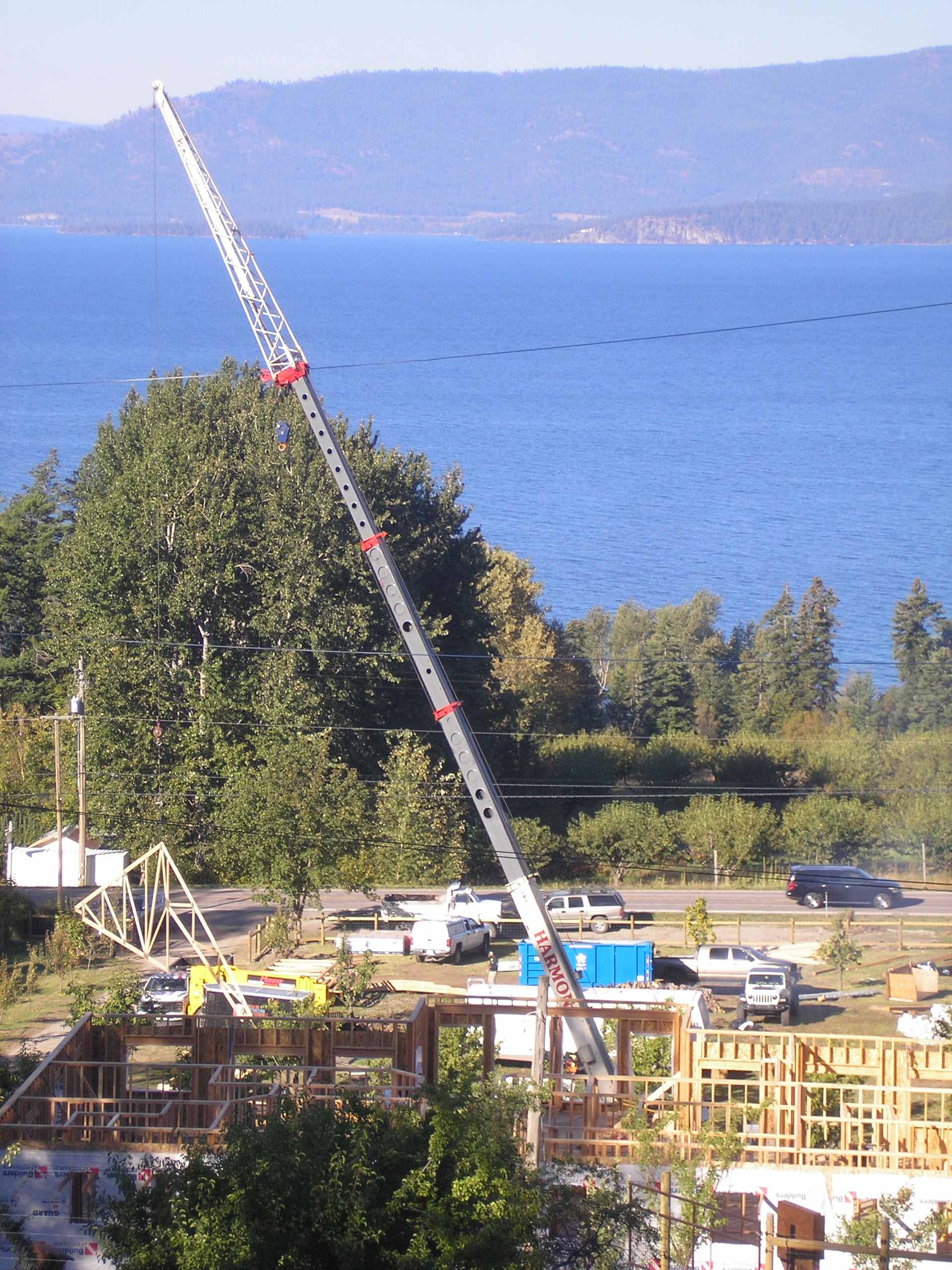 Harmon crane setting trusses at my neighbors new house